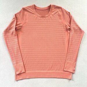 Lululemon Breeze By Long Sleeve shirt in the color Light Coral Medium